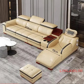 Luxury leather sectional sofa with massage chaise featuring cup holder and elegant design in light color.