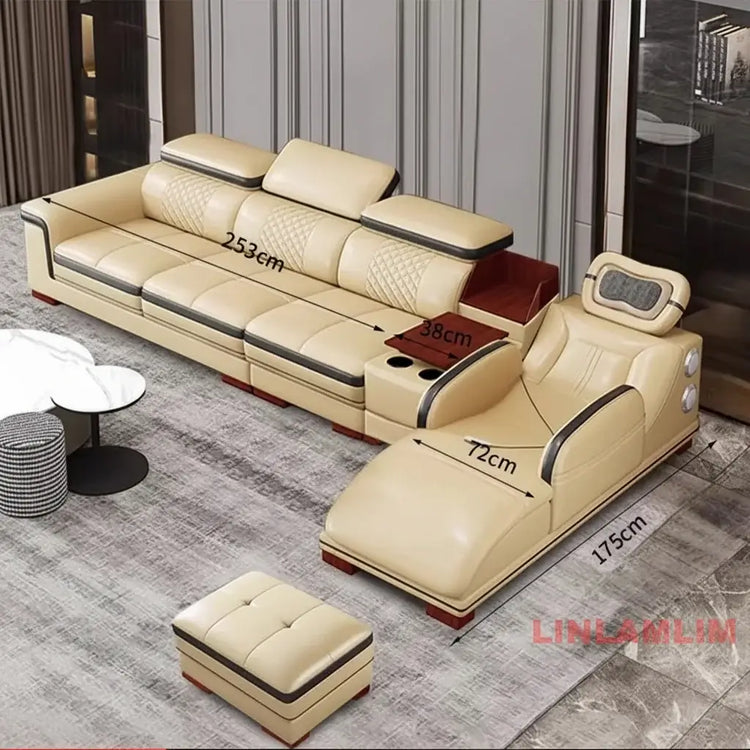 Luxury leather sectional sofa with massage chaise featuring cup holder and elegant design in light color.