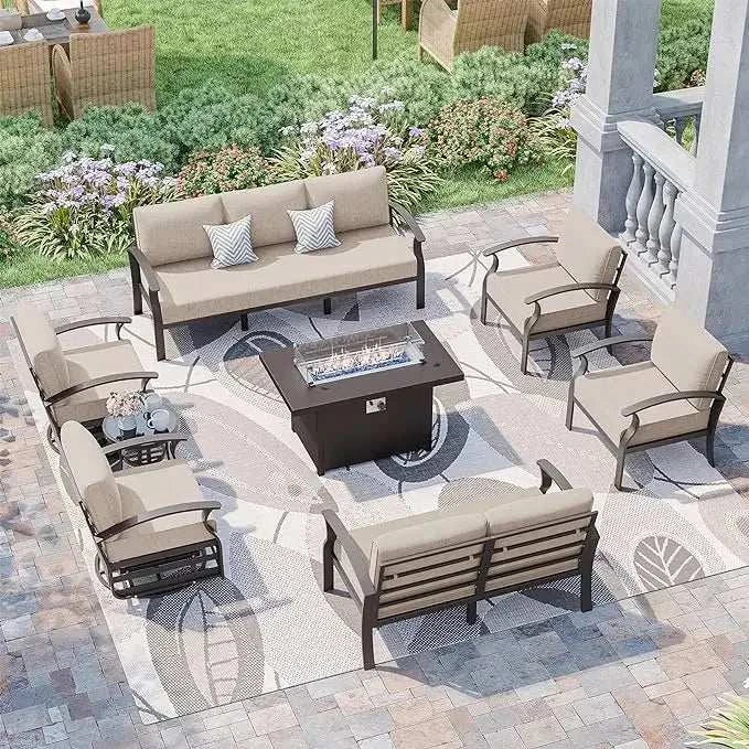 Outdoor patio set with furniture and fire pit table on a stone patio.