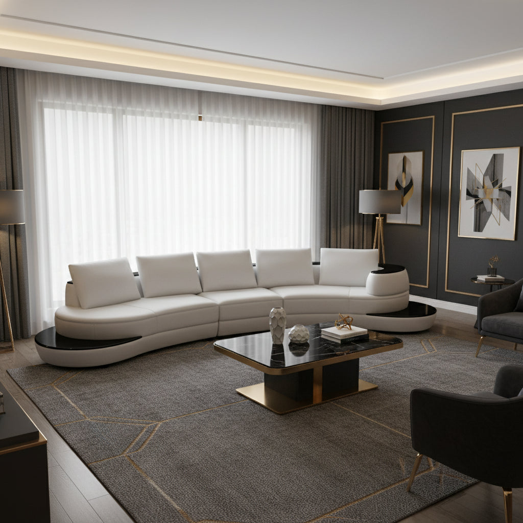 Modern white sofa with black accents in a decorated living room setting gray rug coffee table and paintings on the wall