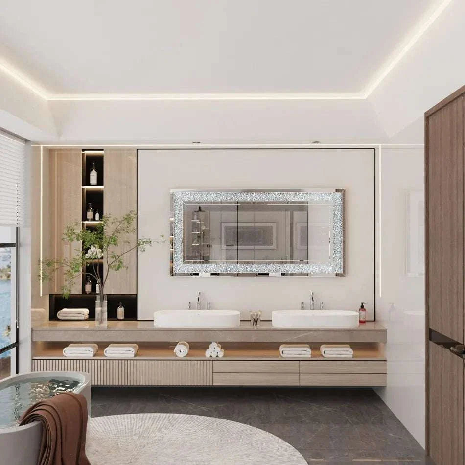 Large silver frameless bathroom mirror with sparkly crystal rhinestone border above double sink vanity