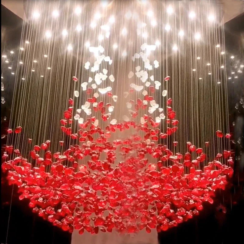 luxury crystal stone chandelier with red and white accents illuminated with LED lighting