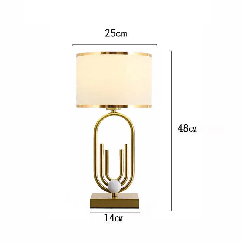 Nordic luxury bedside lamp with elegant gold design and soft white shade, perfect for a romantic atmosphere.