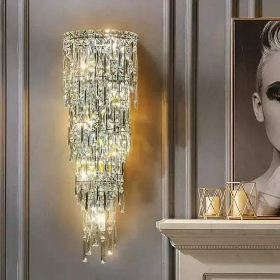 Elegant crystal wall lamp with cascading design and warm light, perfect for enhancing your living space.
