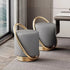 Nordic modern dressing table set with stylish gray stools featuring gold accents and round design.