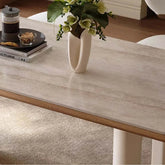 6 person white dining table with modern design, featuring elegant floral centerpiece and cozy decor.