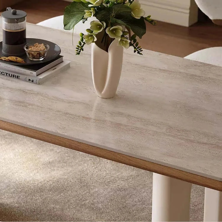 6 person white dining table with modern design, featuring elegant floral centerpiece and cozy decor.