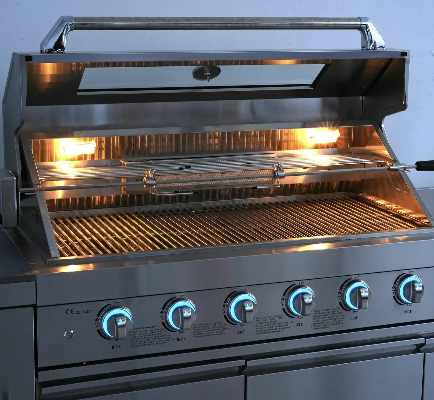 stainless steel outdoor kitchen on wheels with grill and illuminated burners