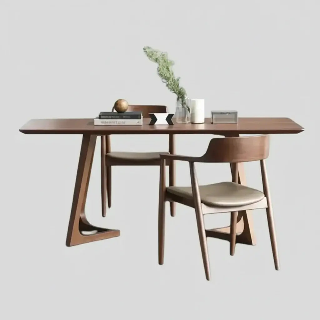 Wooden dining table with chairs on a white background