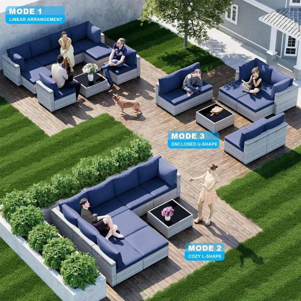 Outdoor patio furniture set with blue and gray cushions arranged in different modes on a patio.