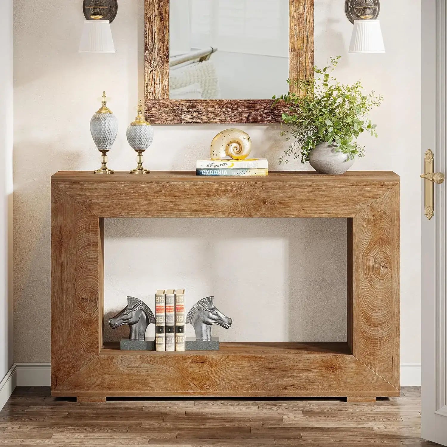 Wooden console table with decorative items in a room setting