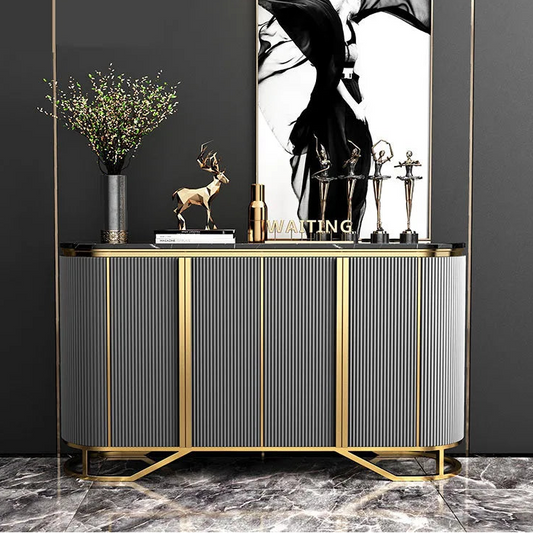 Modern sideboard with decorative items against a dark wall