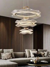 Stunning round modern led ceiling chandelier enhancing a stylish living room interior.