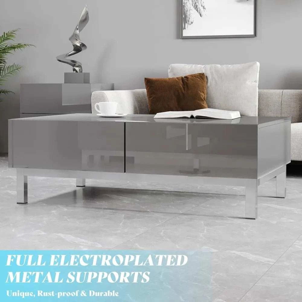Modern living room with a gray high-gloss coffee table, sofa, and decorative elements.