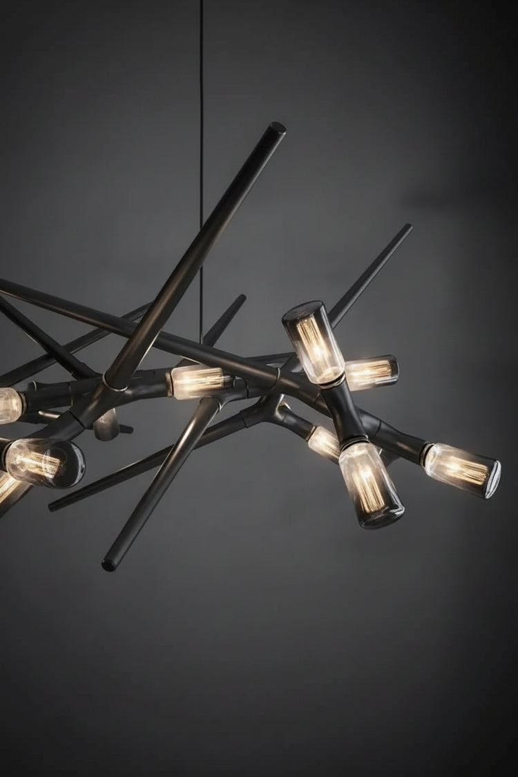 Modern chandelier with multiple light bulbs on a dark background