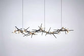 Modern chandelier with branch-like design on a white background