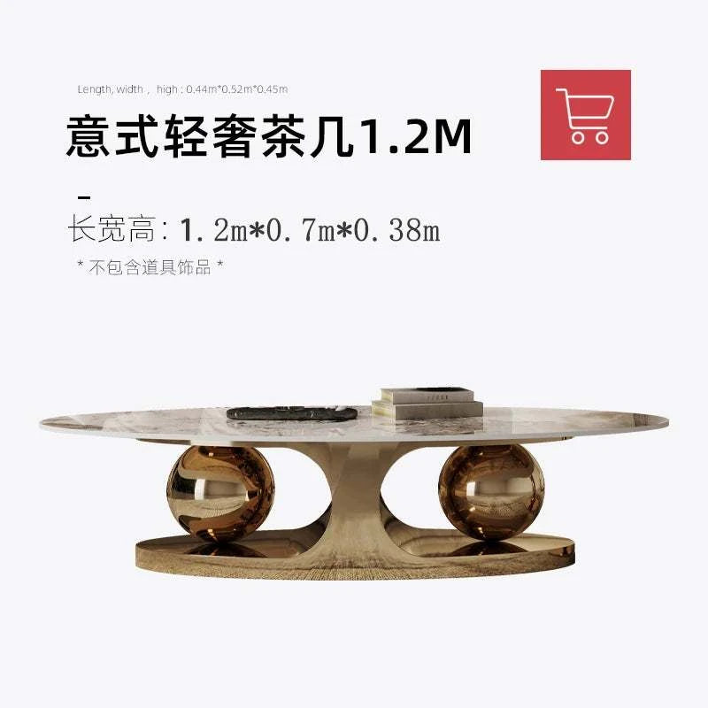 Modern coffee table with marble top and bronze base on a white background