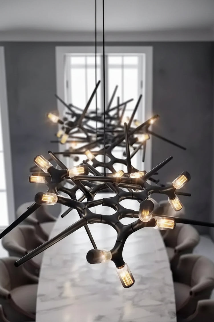 Modern chandelier with black and gold design in a room setting