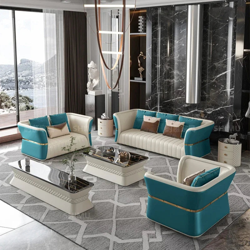Luxury cowhide leather sofa set in a modern living room with turquoise and white upholstery.