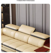 luxury leather sectional sofa with massage chaise, featuring elegant padding and modern design accents.
