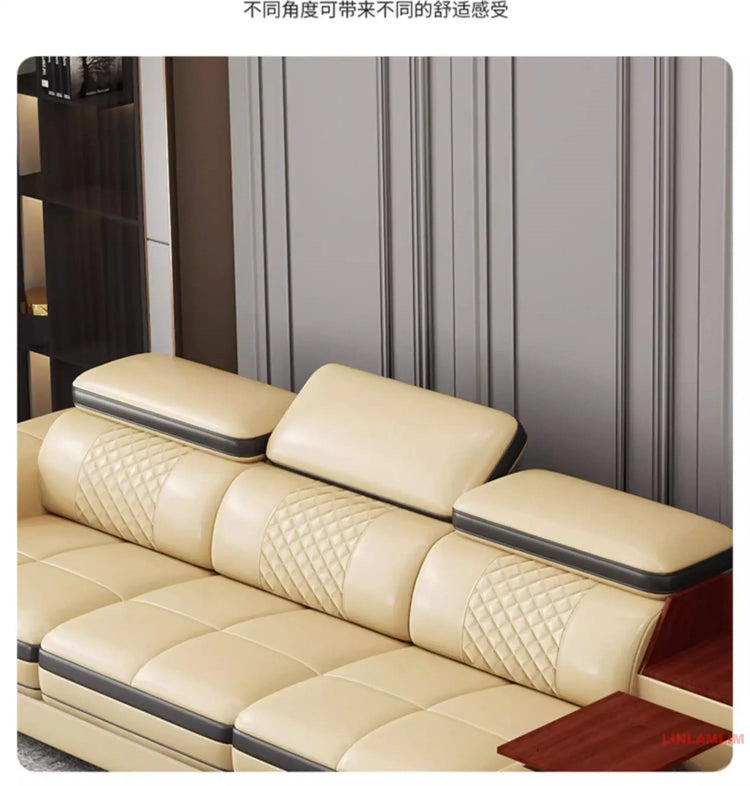 luxury leather sectional sofa with massage chaise, featuring elegant padding and modern design accents.