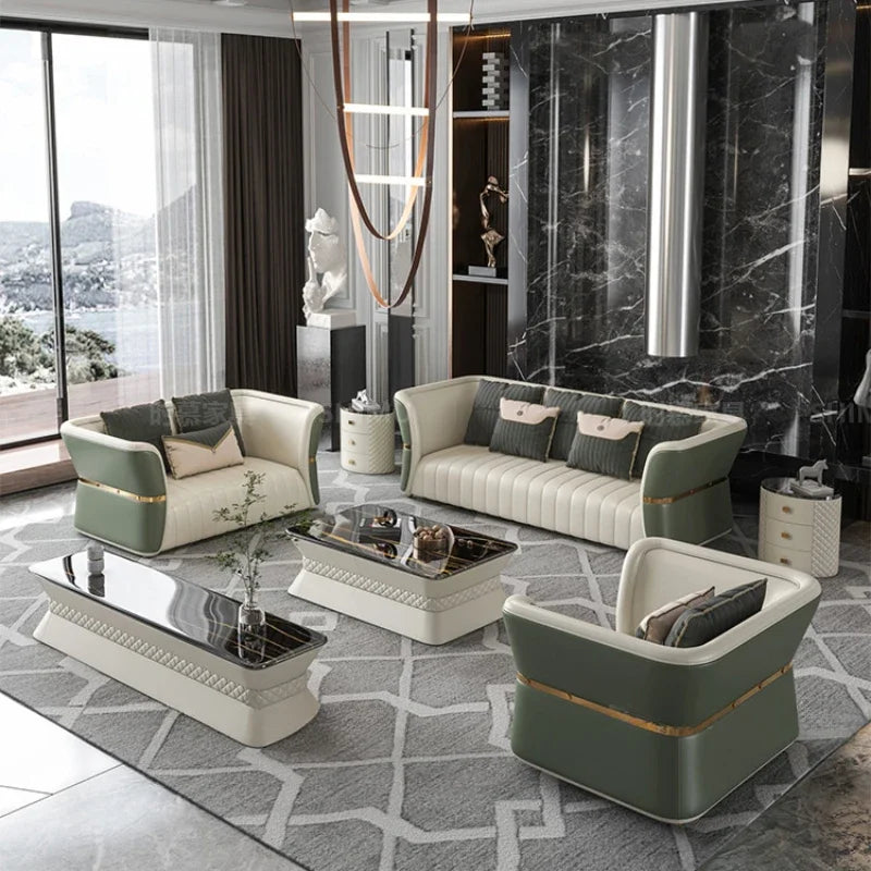 Luxury cowhide leather sofa set in a modern living room with elegant decor and large windows.