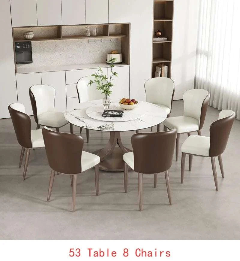 Dining room set with a round table and eight chairs in a modern kitchen.