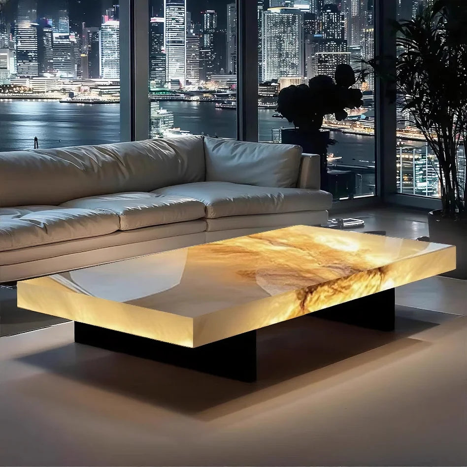 Modern living room with a marble coffee table and cityscape view