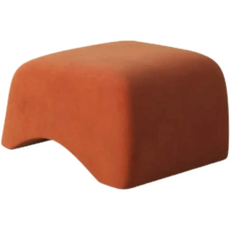 Orange footstool on a white background