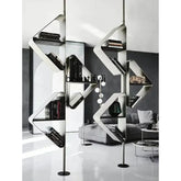 Stainless steel partition bookshelf showcasing modern design with open shelves and books.