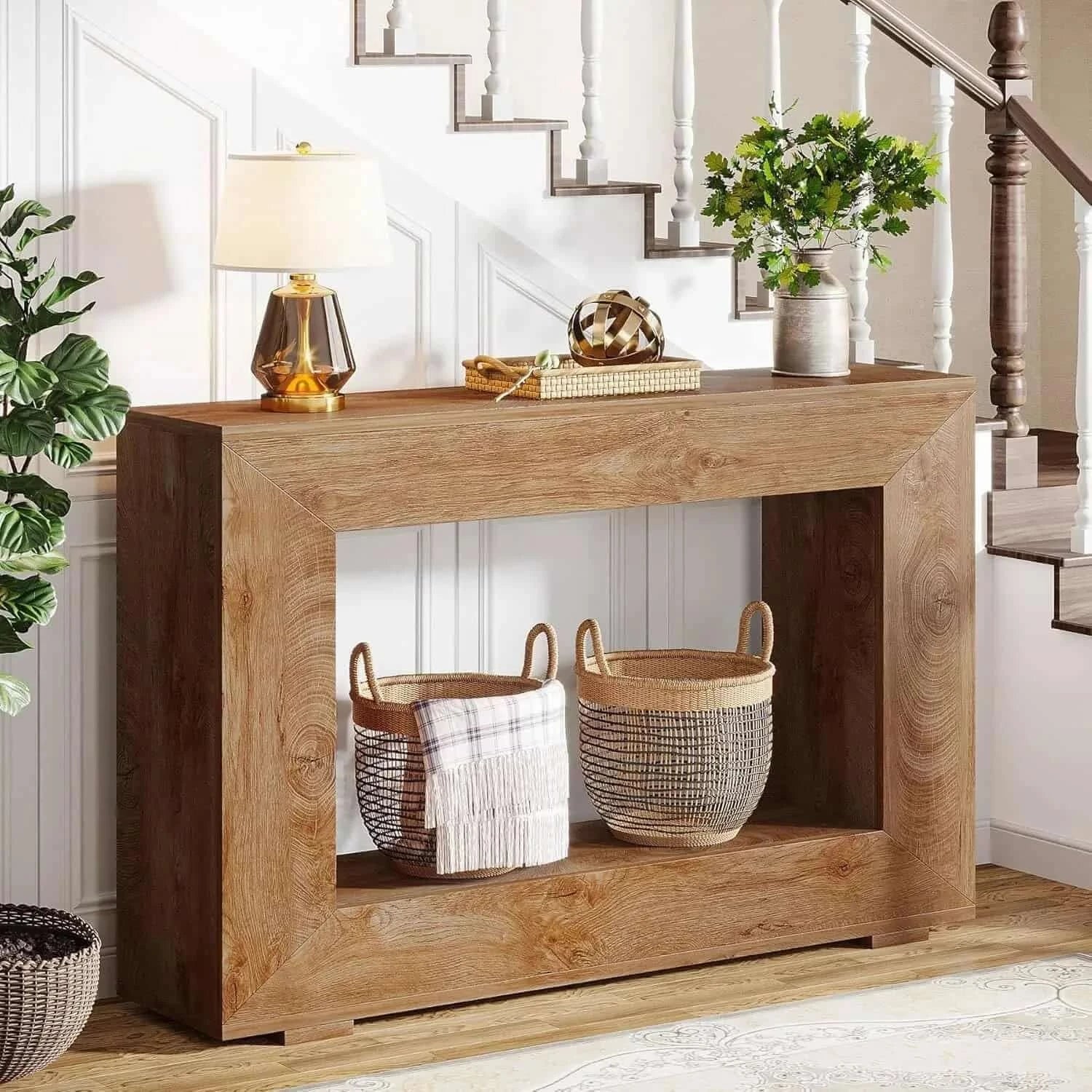 Wooden console table with decorative items in a home setting