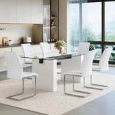Modern dining room with a glass-top table and white chairs.