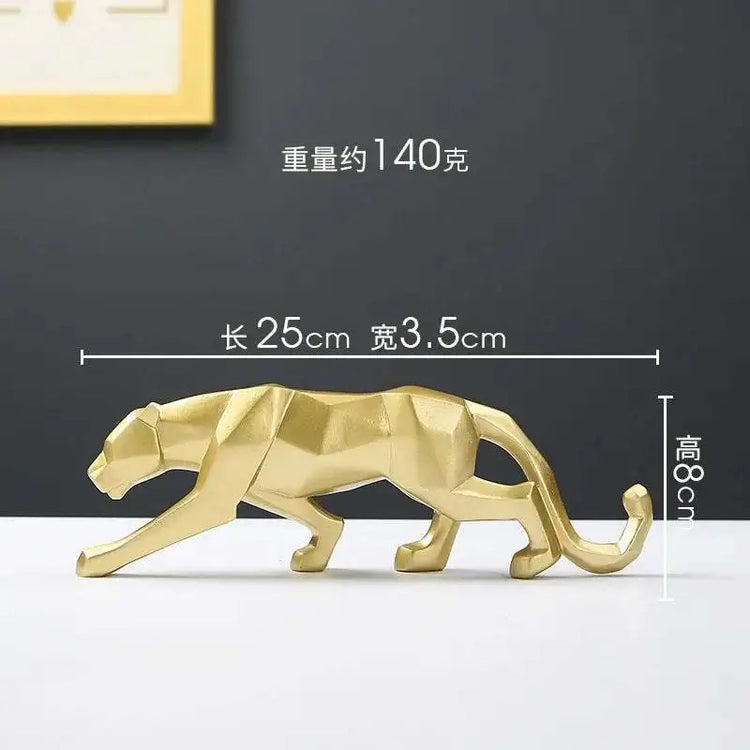 Gold panther figurine with dimensions on a dark background