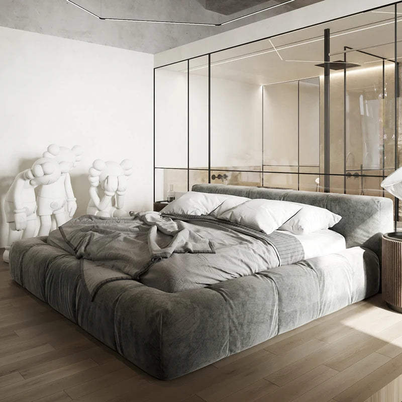Italian upholstered bed frame in a modern bedroom with plush bedding and stylish decor.