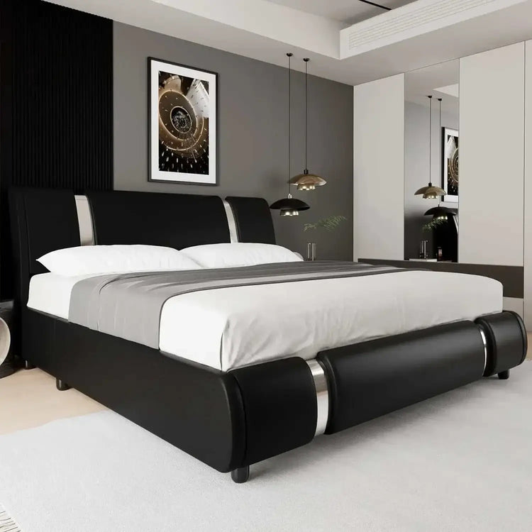 Modern faux leather upholstered platform bed with curved headboard and metal accents in a contemporary bedroom setting
