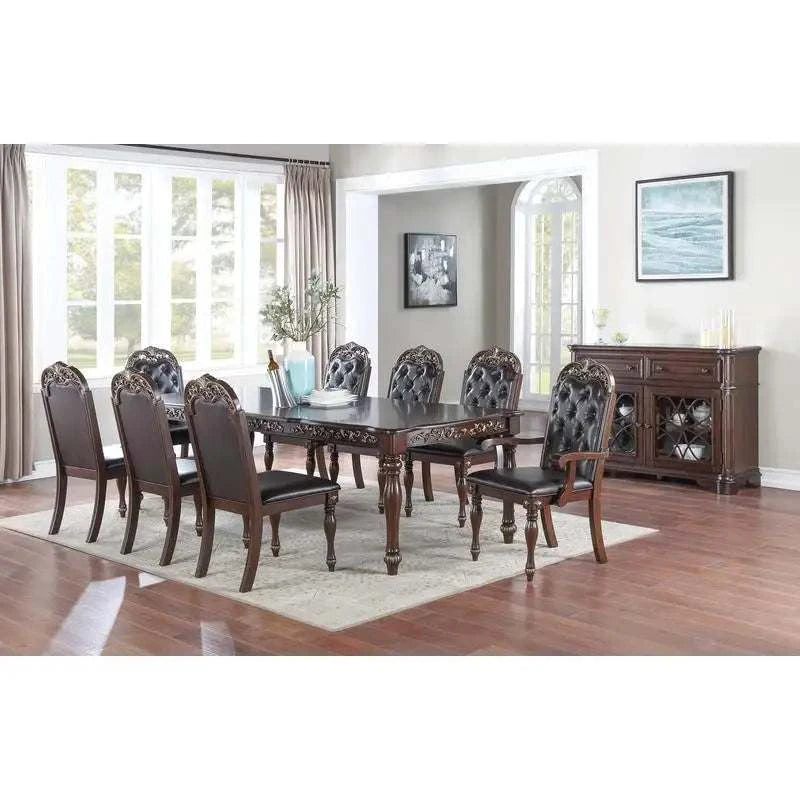 Dining room with a wooden table and chairs in a well-lit room.