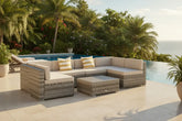 Gray outdoor sectional sofa with beige cushions on a white background