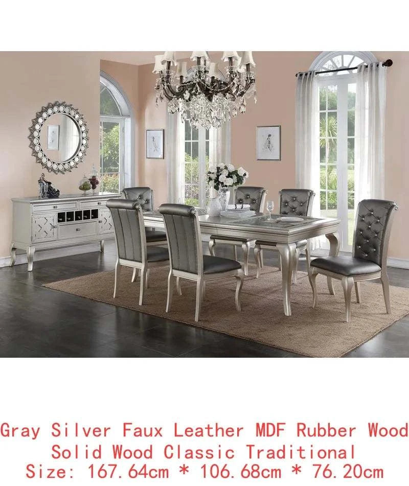 Dining room set with 6 gray chairs and a table in a well-lit room.