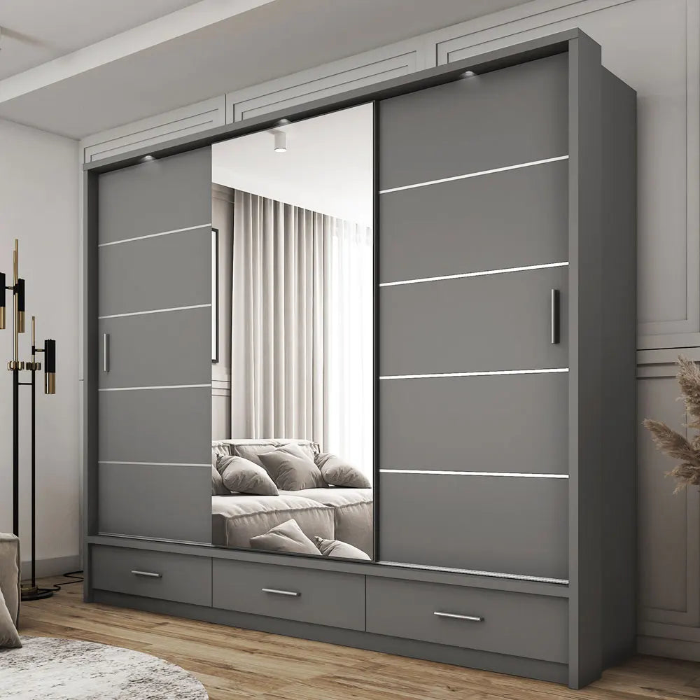 Custom walk-in wardrobe system with sliding mirror doors and storage drawers in a modern bedroom setting.