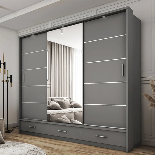 Custom walk-in wardrobe system with sliding mirror doors and storage drawers in a modern bedroom setting.